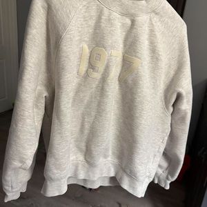 Essentials Heathered Oatmeal 1977 Crew